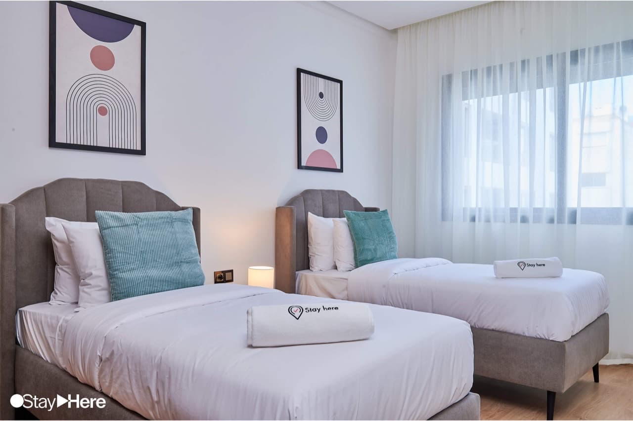 Three-Bedroom Apartment with Balcony at StayHere Rabat - Hay Riad Residential Living — photo 7